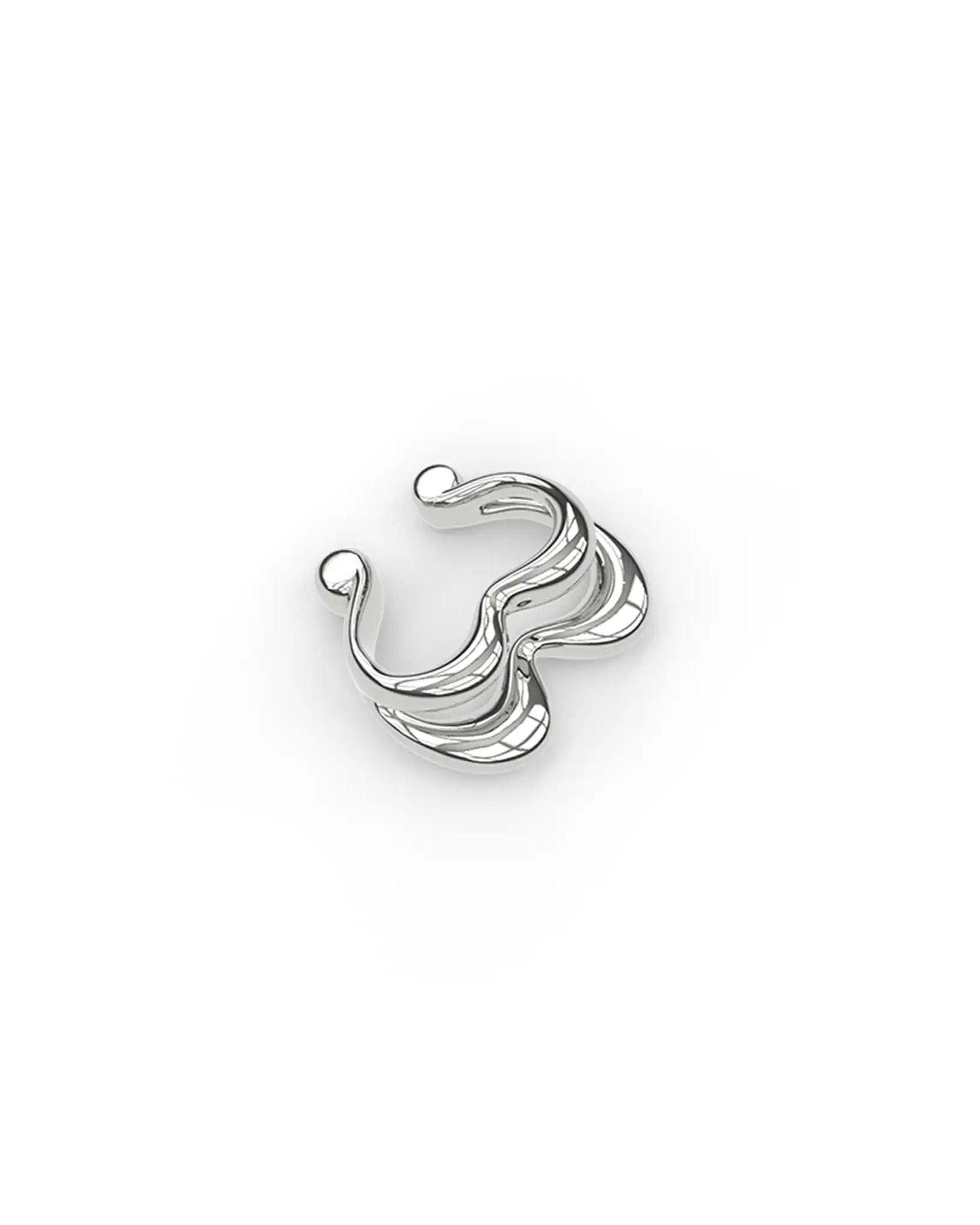 Sterling silver Heartbeat ear cuff, angled top-down shot while laying flat.