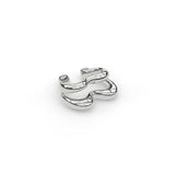 Sterling silver Heartbeat ear cuff, elevated angle showing surface and contour.