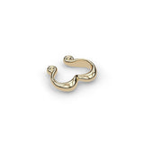 18ct yellow gold Signature Swirl ear cuff, angled perspective highlighting surface contour.
